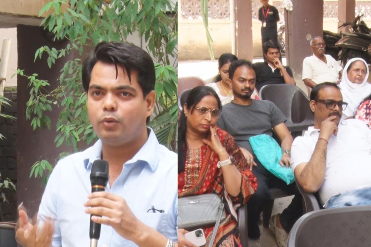 Society members seated together during a redevelopment discussion
